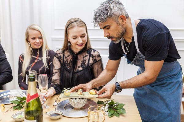 Picture of family enjoying a better gourmet health kitchen.