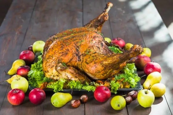 Tasty turkey grilled with garliclemon and cajun with fresh basil and parsley for the best dishes for your thanksgiving dinner